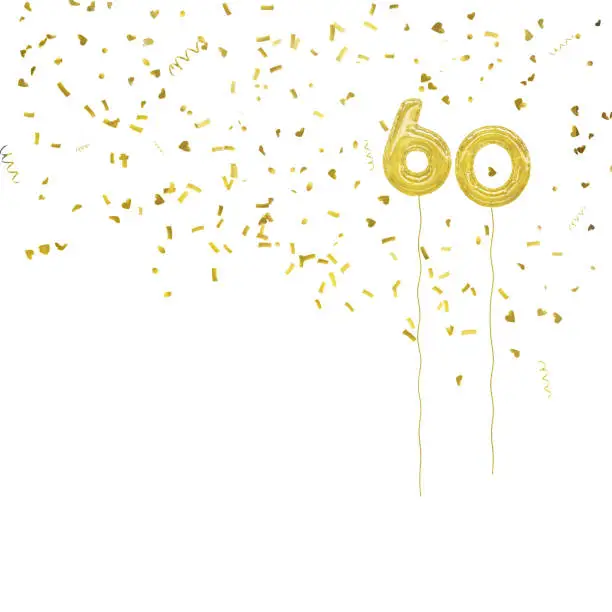 Photo of Golden foil balloon numbers, with gold confetti. White background.