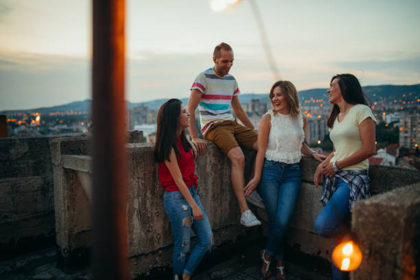istock Friends on the rooftop party 819690308