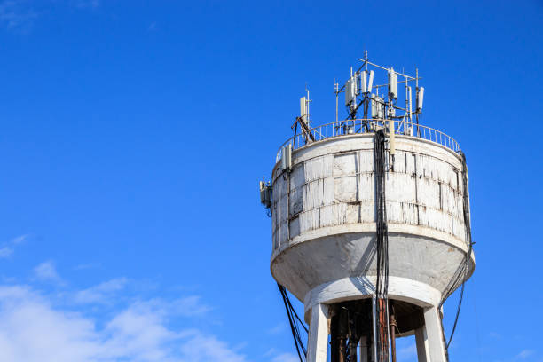 istock Water depot with mobile phone masts 819700494
