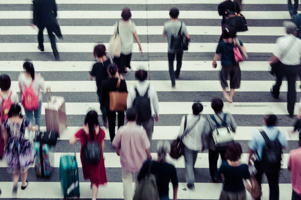 istock Asian People are across the crosswalk 819719912