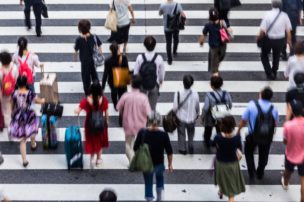 istock Asian People are across the crosswalk 819719982