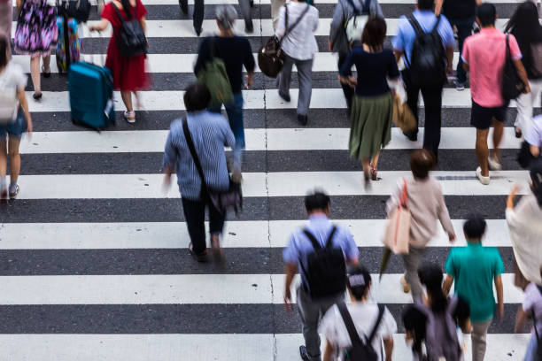 istock Asian People are across the crosswalk 819720098