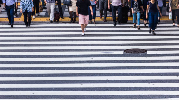 istock Asian People are across the crosswalk 819721044