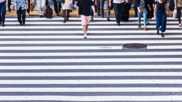 istock Asian People are across the crosswalk 819721322