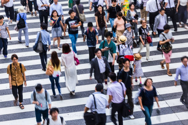 istock Asian People are across the crosswalk 819723310