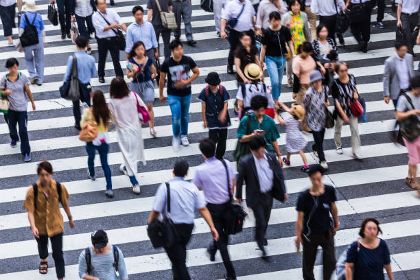 istock Asian People are across the crosswalk 819723374