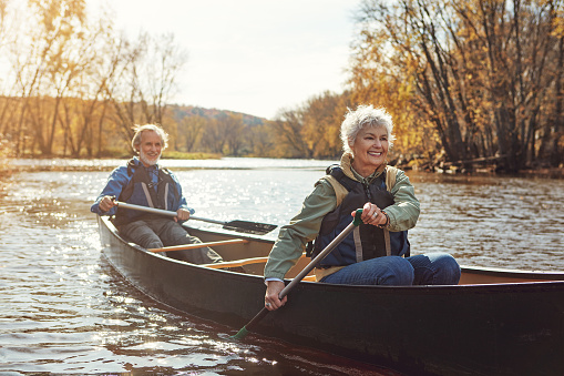 Shot of a senior couple going for a canoe ride on the lake