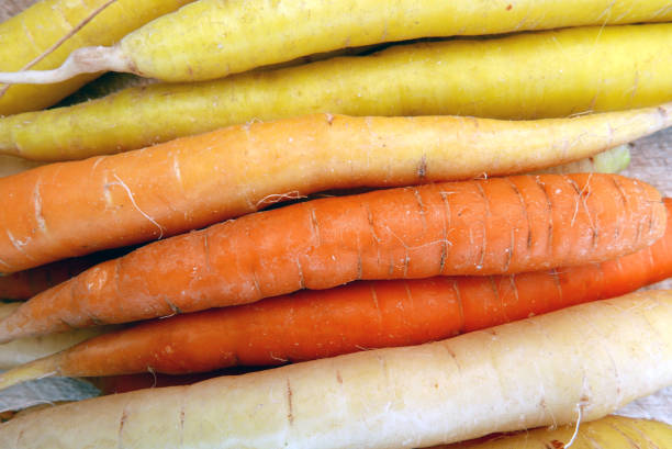 istock Yellow, White and Orange Carrots 819730670