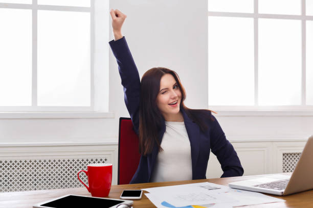 istock Business woman enjoying successful project 819737972