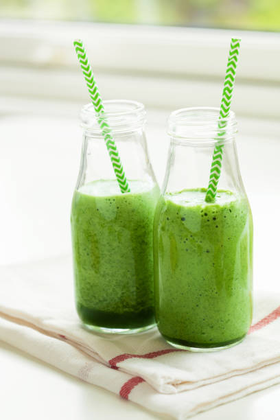 istock healthy green spinach smoothie with cilantro lime banana ginger 819738586