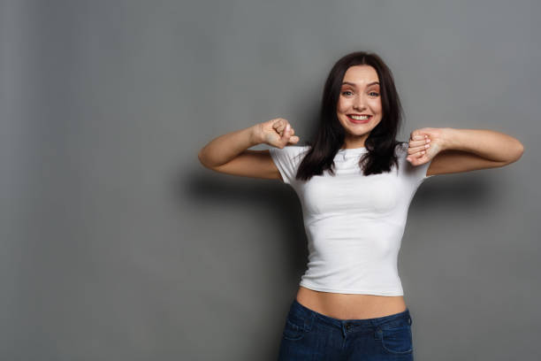 istock Happy girl posing to camera and shouting 819743008