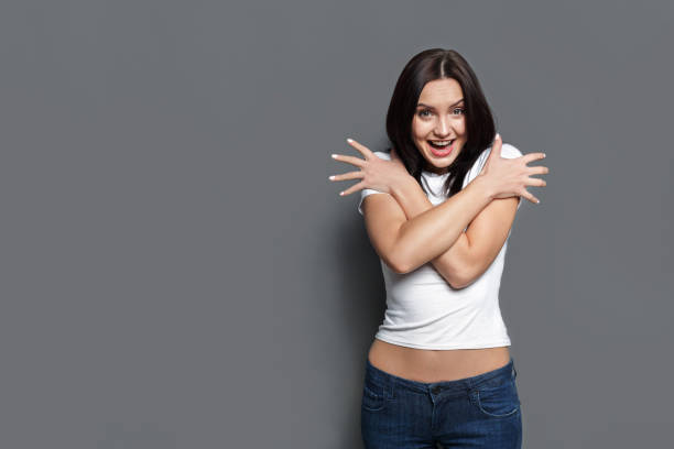 istock Feeling surprised, woman expressing delight 819743044