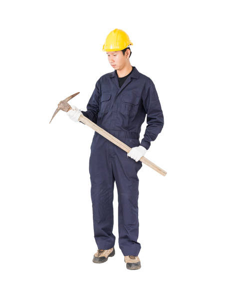 istock Man in uniform hold old pick mattock that is a mining device 819744772