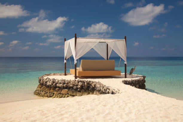 istock bed in the Maldives 819749426