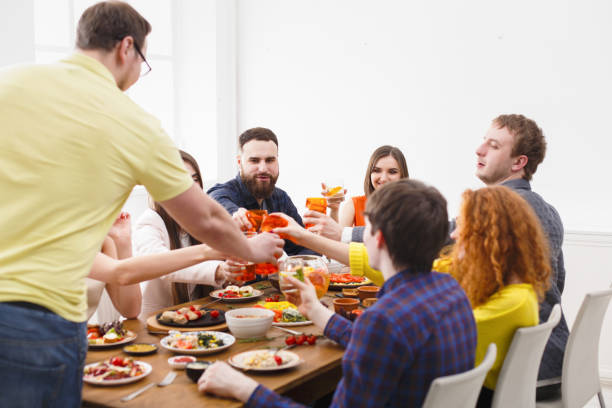 istock Saying toast at party dinner with friends 819766220
