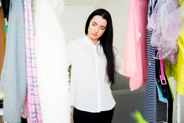 istock Woman cannot decide what to wear 819775984