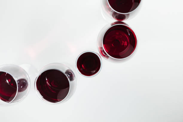 istock top view of red wine in glasses arranged isolated on white 819778536