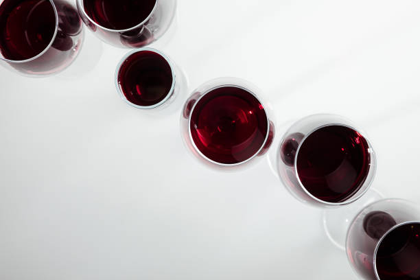istock top view of red wine in glasses arranged isolated on white 819781146