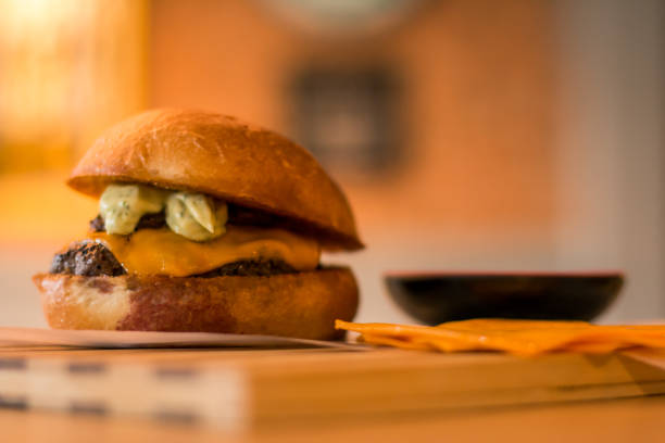 istock hamburguer artisan in table wood background 819798600