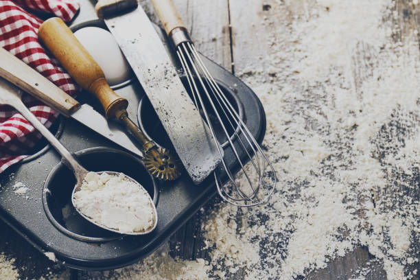 istock Baking concept kitchen cooking cutlery accessories for baking on wooden background with flour. Top View. Cooking Process. Nobody. 819810874
