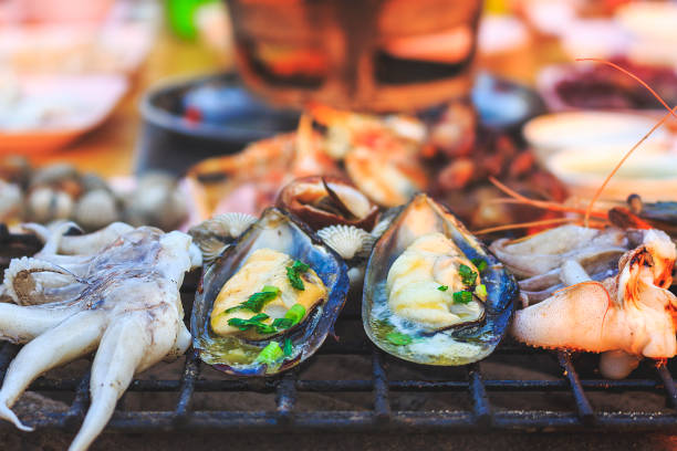 istock Grill cheese shell cooking squid seafood with soft-focus in the background eat restaurant. Over light 819811492