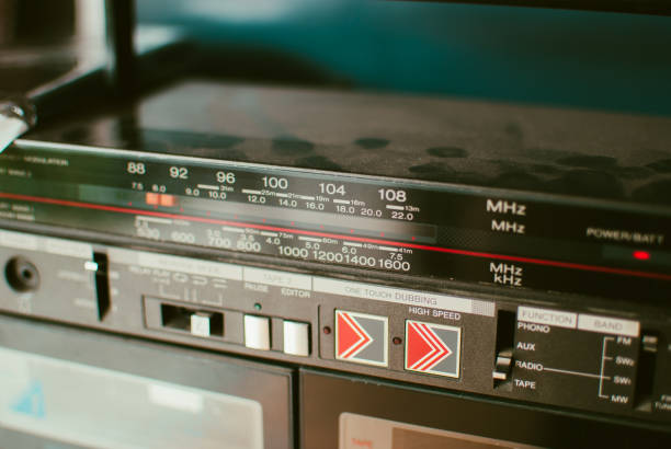 istock Retro dusty boombox (tape recorder) on shelf in garage 819811556