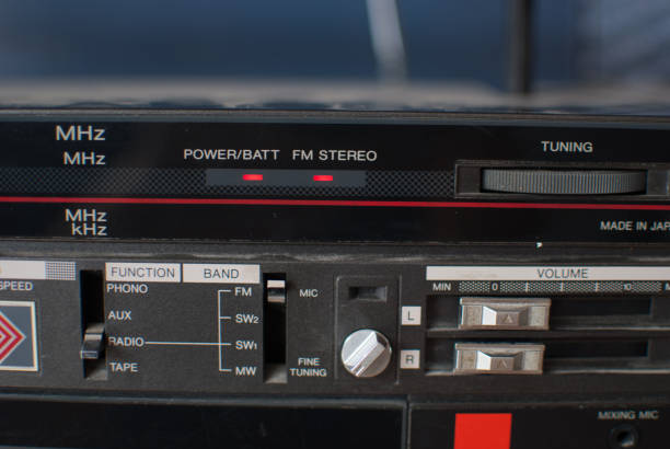 istock Retro dusty boombox (tape recorder) on shelf in garage 819811820