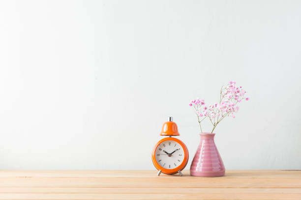 istock Indoor plant on wooden table and white wall 819818294