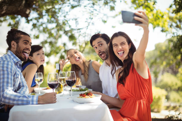 istock Group of friends clicking a selfie 819818706