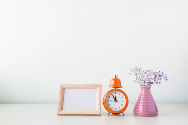 istock Indoor plant on wooden table and white wall 819825578