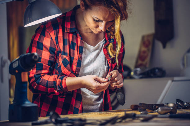 istock Young Creative Woman Working Late in Dark Room 819826594
