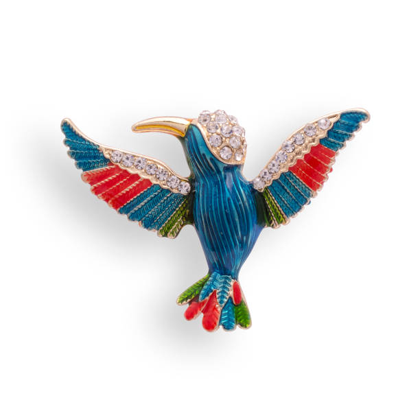 istock enamel brooch with Hummingbird and diamonds isolated on white 819833502
