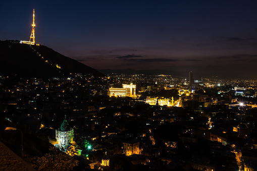 View at night over the capital city of Tbilisi, in Georgia, Eastern Europe.