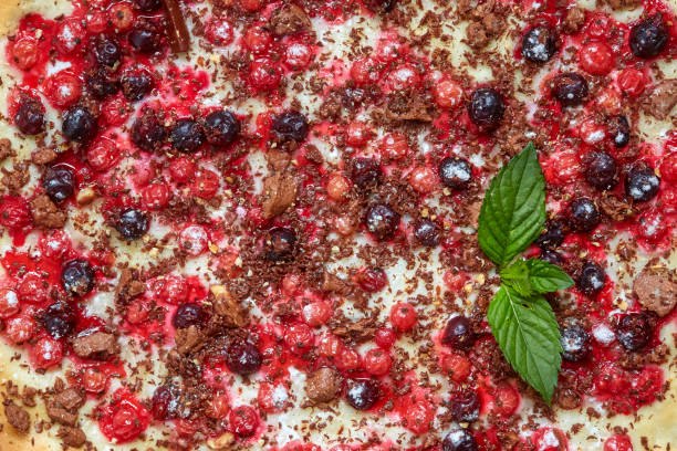 istock Sweet pizza with currant, redcurrant, mint and chocolate 819842722