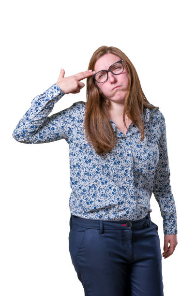 istock Pretty business woman making suicide gesture over blur background 819851300
