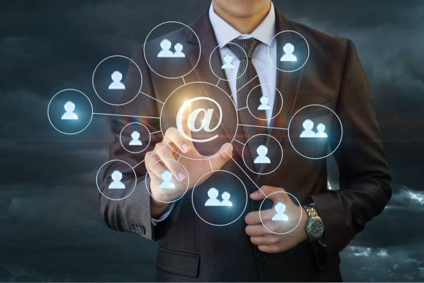 istock Businessman doing a mass mailing to network . 819856960