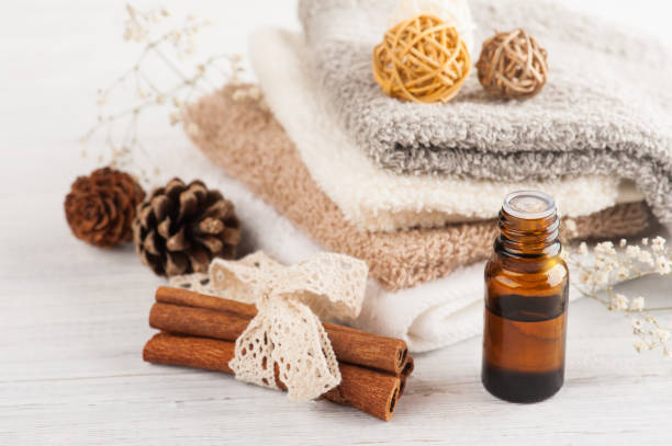 istock Spa composition with essential oil and towels 819857258
