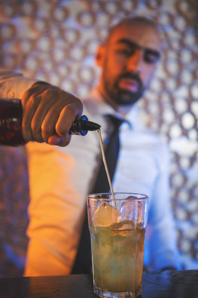 Bartender making cocktails