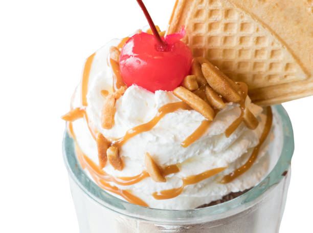 istock Maraschino cherry on the top ice cream glass. 819865362