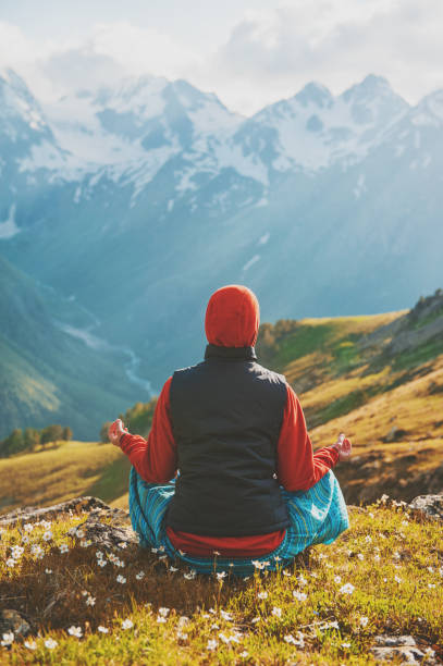 istock Woman doing exercise on the top of mountain 819869870