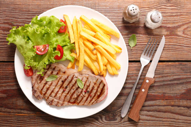 istock beef steak with french fries 819870034
