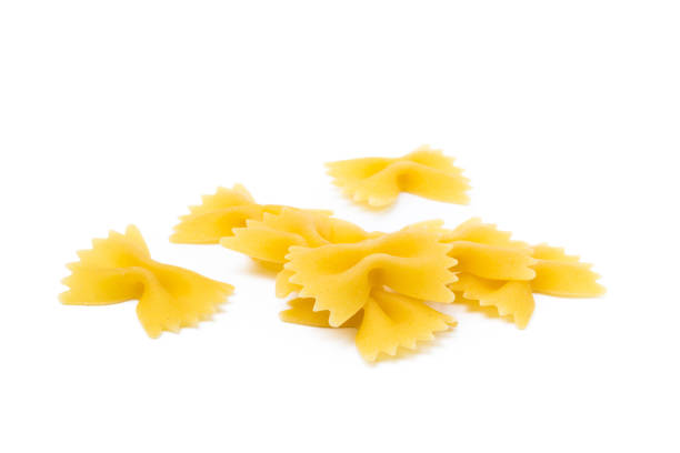 istock Traditional farfalle pasta isolated on a white background 819877874