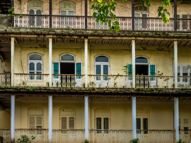 Dilapidated building equipped with many AC units in New Delhi, India