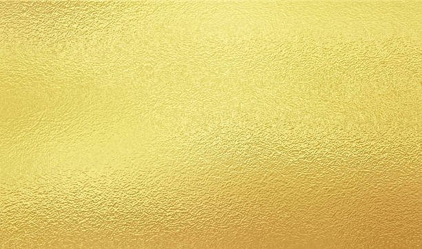 輝くゴールド箔 - wrapping paper foil gold paper ストックフォトと画像