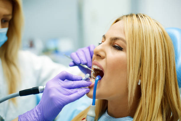 istock Woman at dentist office 819902944