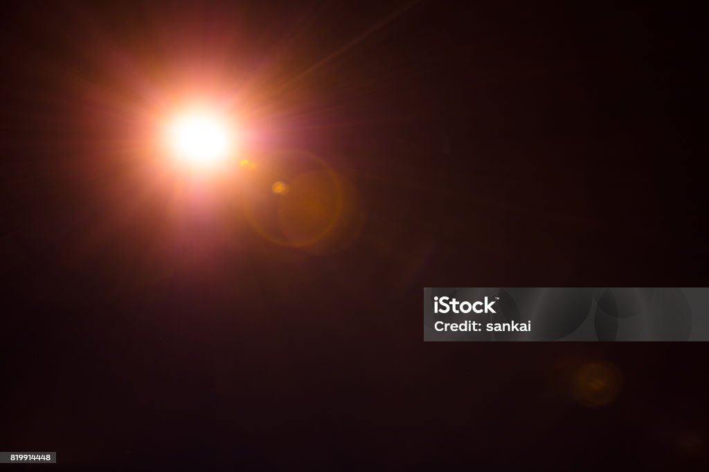 Photorealistic lens flare isolated on black background Lens Flare Stock Photo