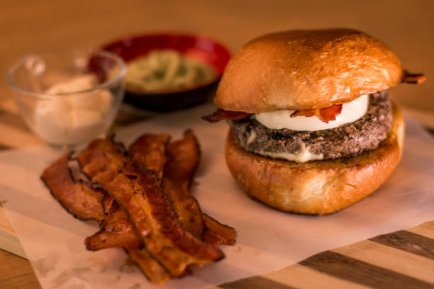 istock hamburguer artisan in table wood background 819917518