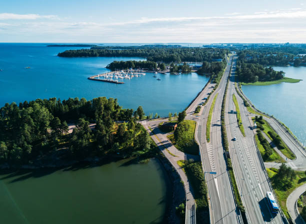 Aerial View of road above a lake stock photo