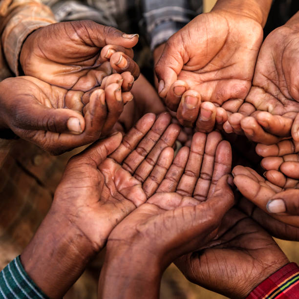 istock Poor Indian children asking for food, India 819934202