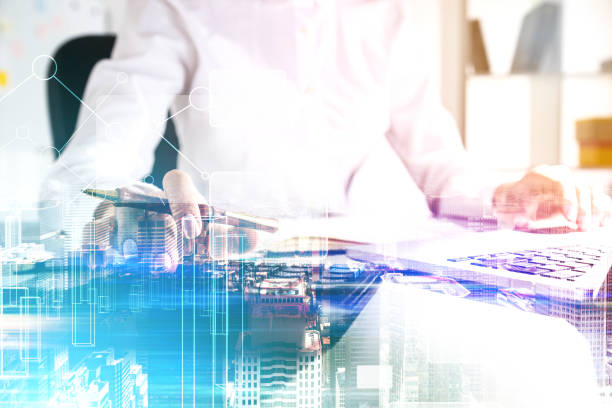istock Businesswoman typing in office, blue graphs 819935096
